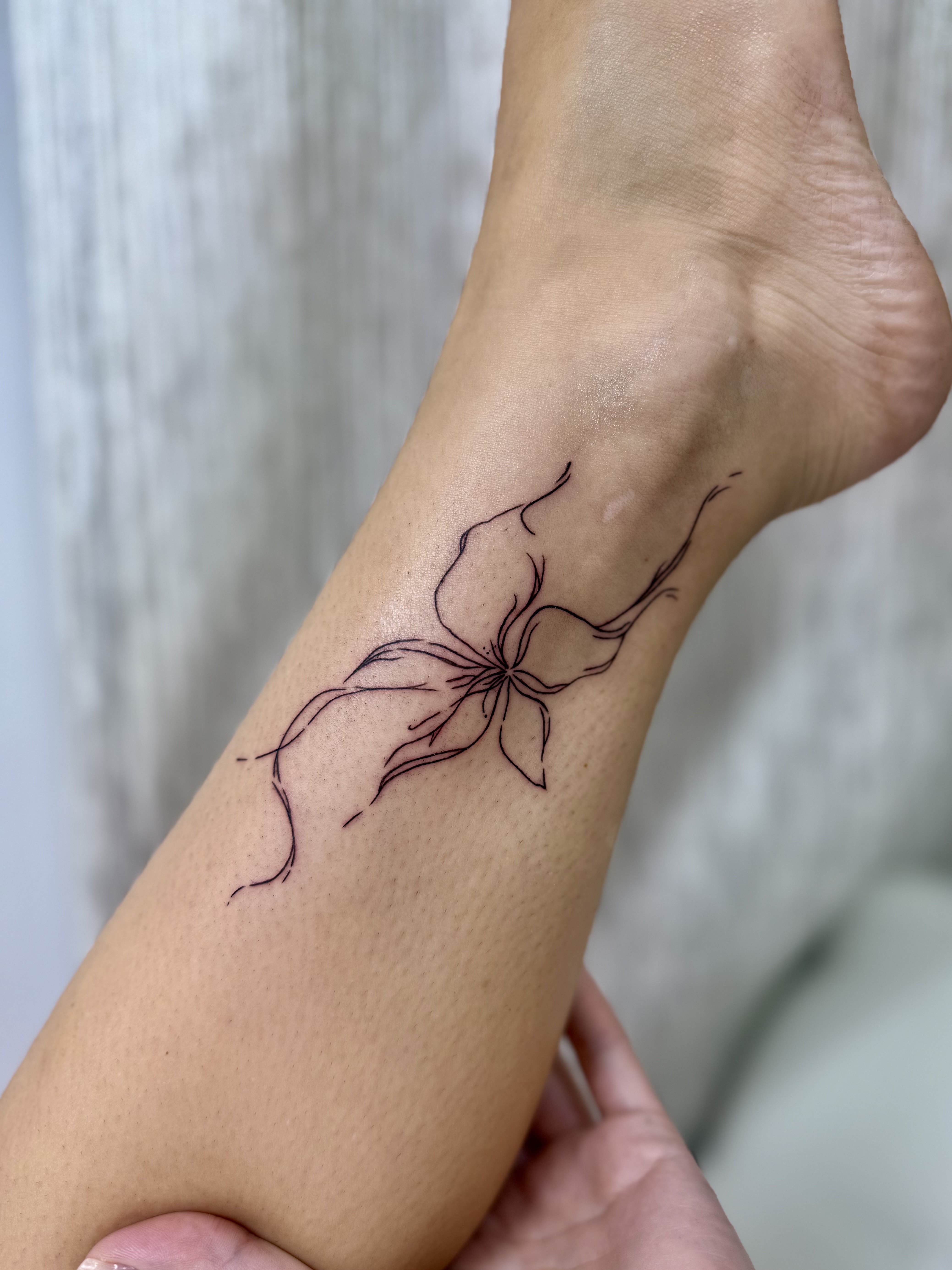 Fine line tattoo
